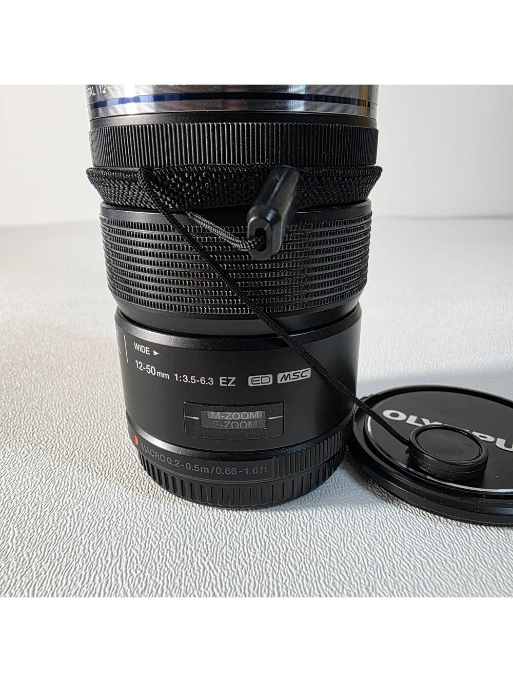 OLYMPUS M. Zuiko Digital 12-50mm f/3.5-6.3 EZ ED MSC Lens Both Caps